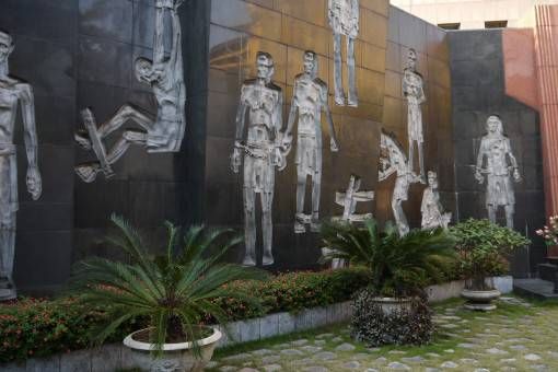 Mural at the Ho Lao Prison Museum in Hanoi