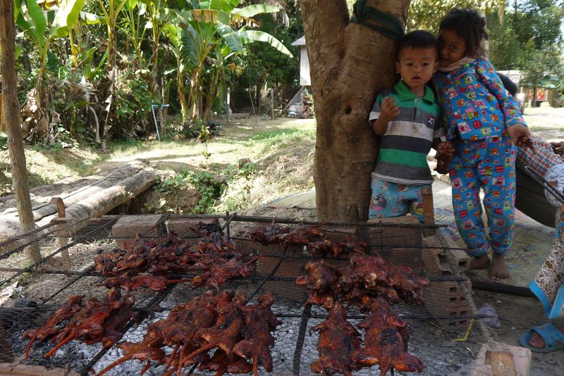 Kids Eating BBQ Rat in Cambodia
