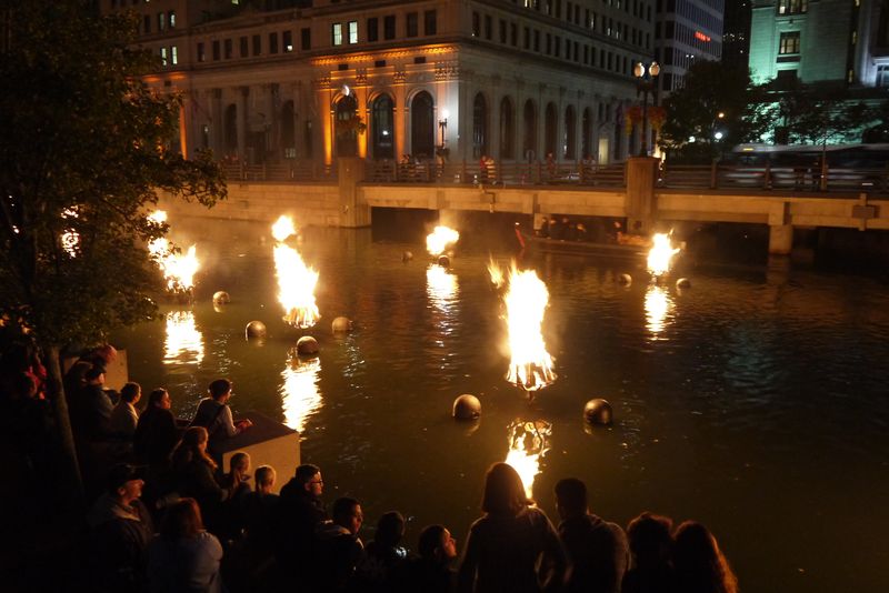 People enjoying Providence's WaterFire Festival