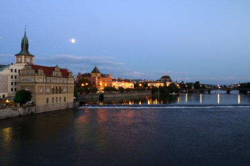 View from the Prague Bridge over the river at night