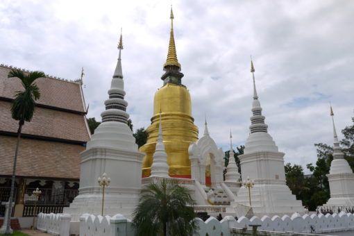 Gold and white pagodas at Wat Suan Dok in Chiang Mai