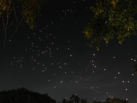 Paper Lanterns Released into the sky during Yi Peng Festival in Chiang Mai