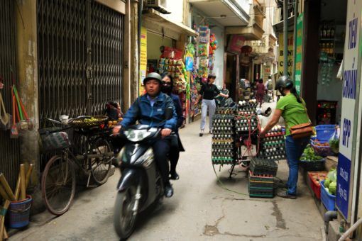 Motorbiking through Hanoi's narrow streets