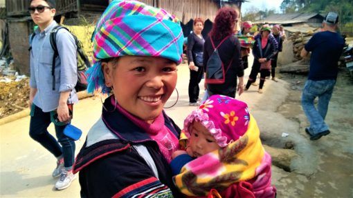 Our trekking guide with her baby in Sapa, Vietnam 