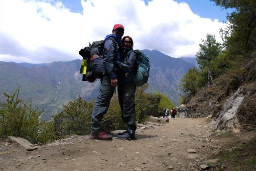 Us with our backpacks starting the Everest Base Camp Trek in Nepal