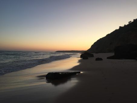 Salema Beach at sunset in the Algarve, Portugal