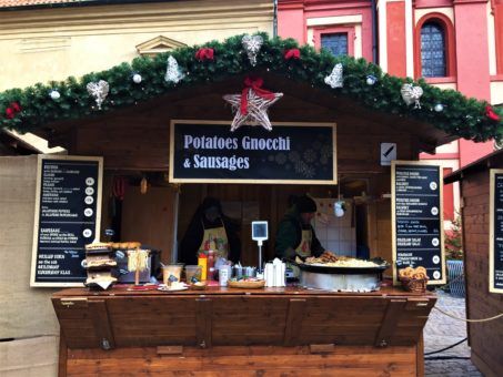 Food stall selling potatoes and sausages at the Prague Xmas Markets 2017
