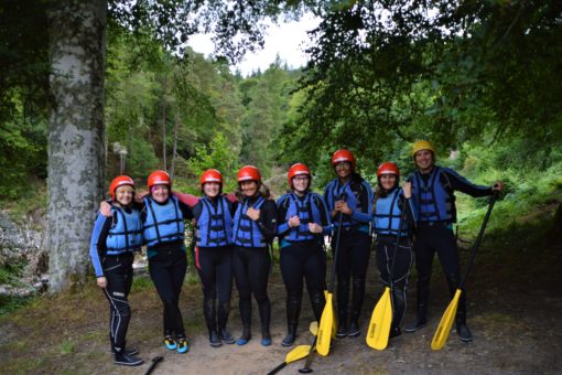 Yoga camp at ACE Adventures preparing to go white water rafting on the River Findhorn