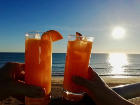 Fresh orange juice overlooking Vale Do Lobo Beach, Portugal