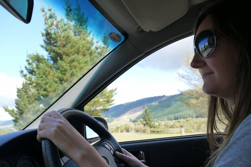Amy driving in New Zealand