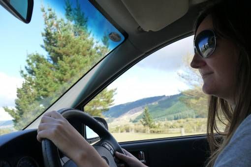 Amy driving in New Zealand