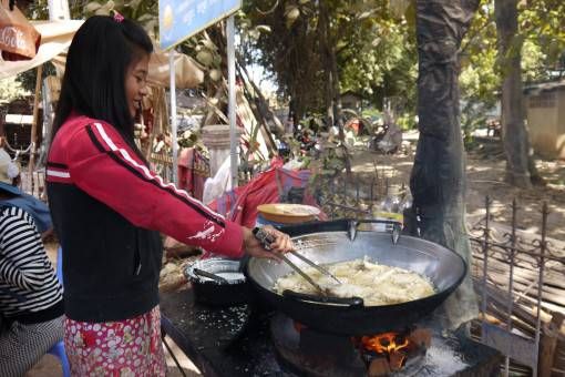 Cambodian Woman Cooking Banana Fritters