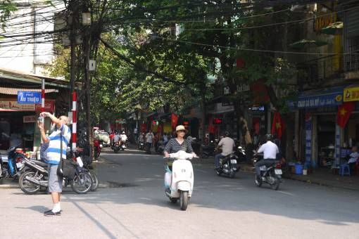 Tree and wire-lined street in Hanoi's Old Quarter