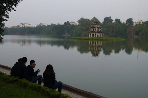 People Relaxing by the Lake in Hanoi, Vietnam