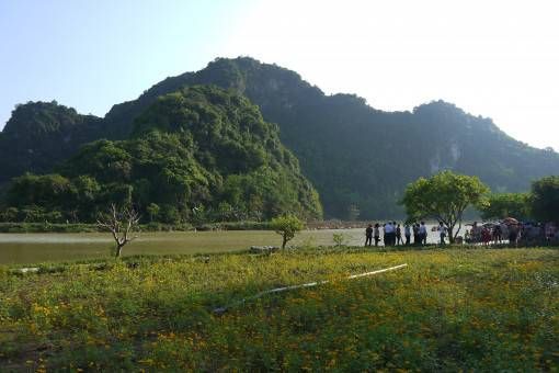 Fields, mountains and river in Tam Coc, Vietnam