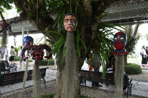 Terminator Head hanging from a tree at the White Temple in Chiang Rai