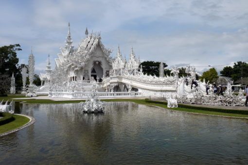 The White Temple in Chiang Rai and its lake 