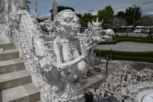 Statue on the Cycle of Rebirth Bridge at the White Temple