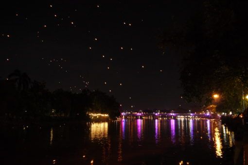 Paper lanterns in the sky during Yi Peng festival in Chiang Mai