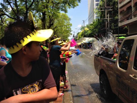 Boy preparing to attack during the Songkran festival in Chiang Mai