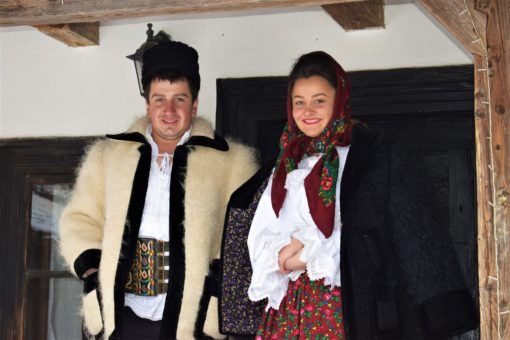 Locals wearing traditional Romanian costumes