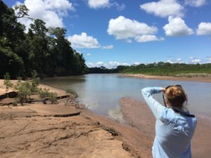 Photographing a river in the Amazon Rainforest in Bolivia, at Madidi National Park