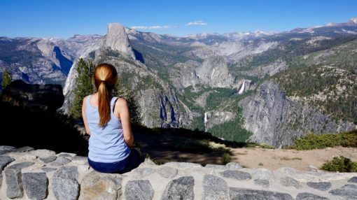 Amy taking in the view of Half Dome from Glacier Point in Yosemite
