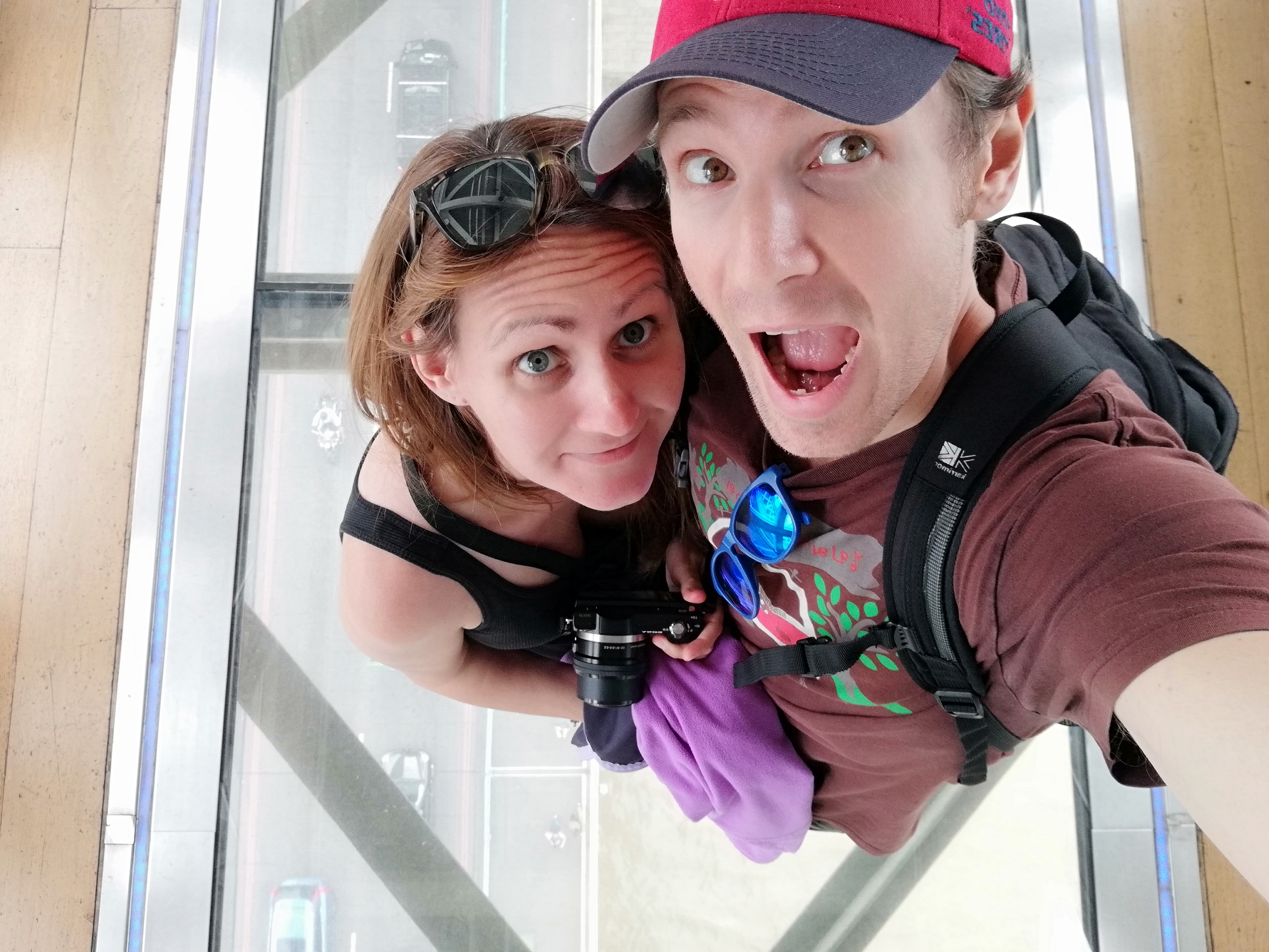 Us on the glass walkway at Tower Bridge in London