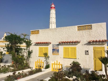 Lighthouse and Portuguese house on an island in the Ria do Formosa, Algarve