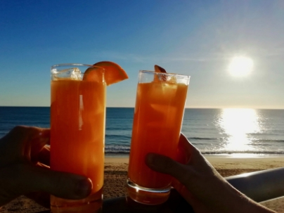 Toasting six years of travel by the beach