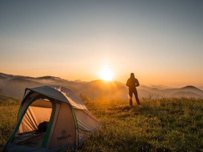 wild camping in the mountains at sunrise